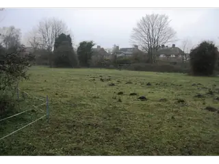 Terrain 900 m² clôturé — route de Kpalimé